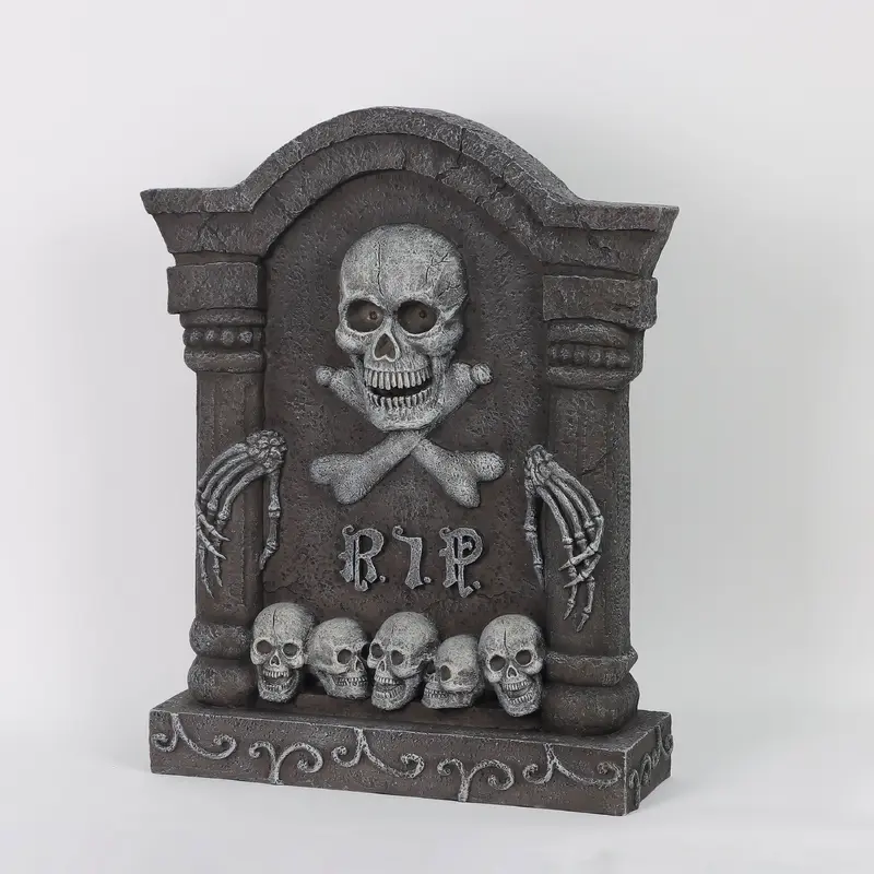 24"H. Polyresin Tombstone With Skulls