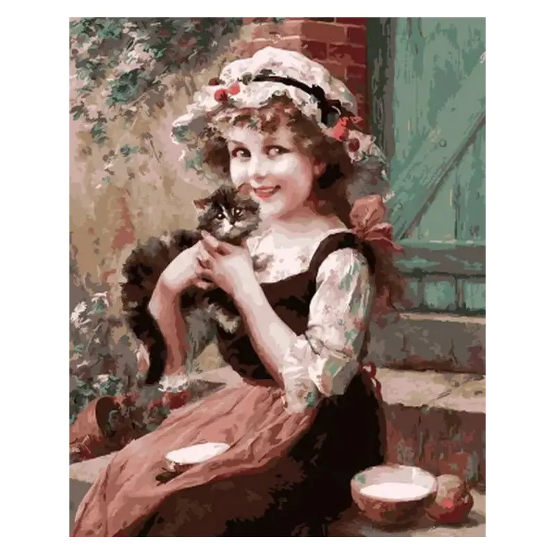 A Little Girl With A Kitten